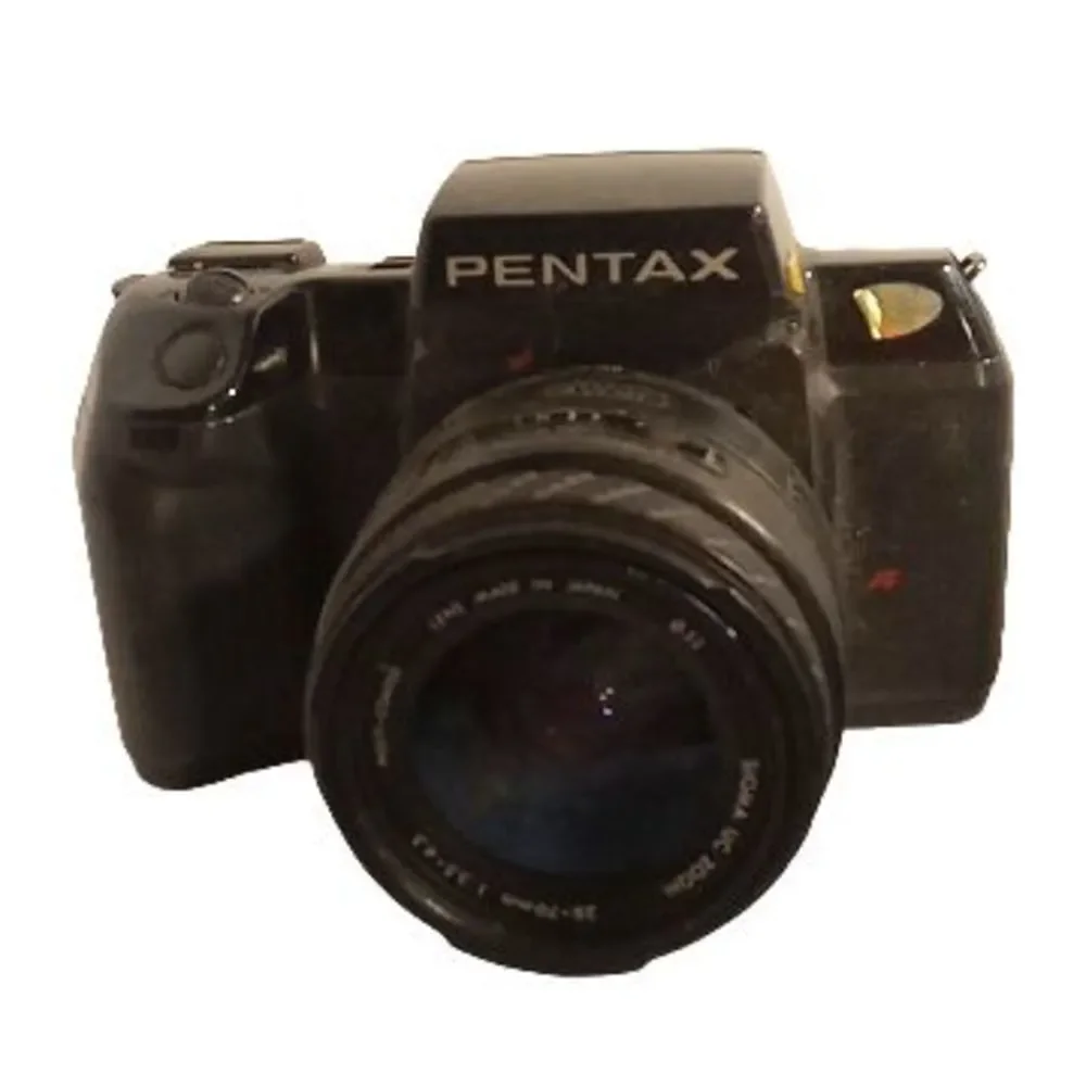 Pentax SP10 35mm SLR Camera With 28-70mm Zoom Lens